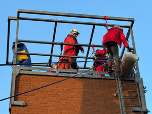 Moving the stretcher on top of the tower ...